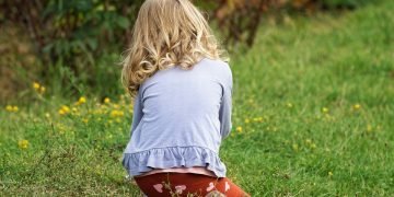 Child enjoying healthy foods to boost their immune system and overall health.