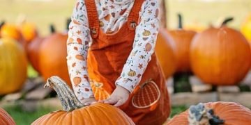 Young girl studying at a desk, embodying academic excellence in parenting.